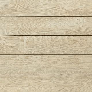 Close-up of Millboard Enhanced Grain composite decking in Limed Oak finish, displaying pale blonde tones and realistic wood grain texture for a light, coastal-inspired aesthetic