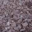 Detailed view of 40mm crushed plum slate chippings showing natural purple tones and angular slate texture, ideal for gardens and driveways