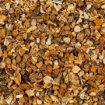 Close-up of 20mm gold flint gravel showcasing natural golden and amber tones