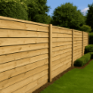 A wooden fence installation in a garden setting, featuring evenly spaced 75mm x 75mm treated fence posts supporting horizontal timber panels. The scene showcases a clean, natural look ideal for residential outdoor spaces